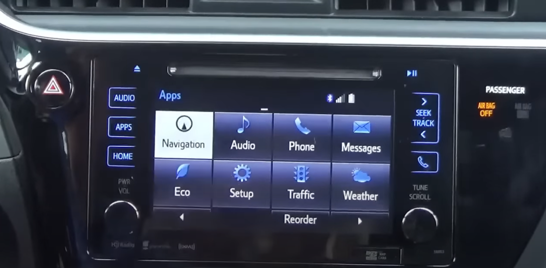 Hand touching the car navigation screen