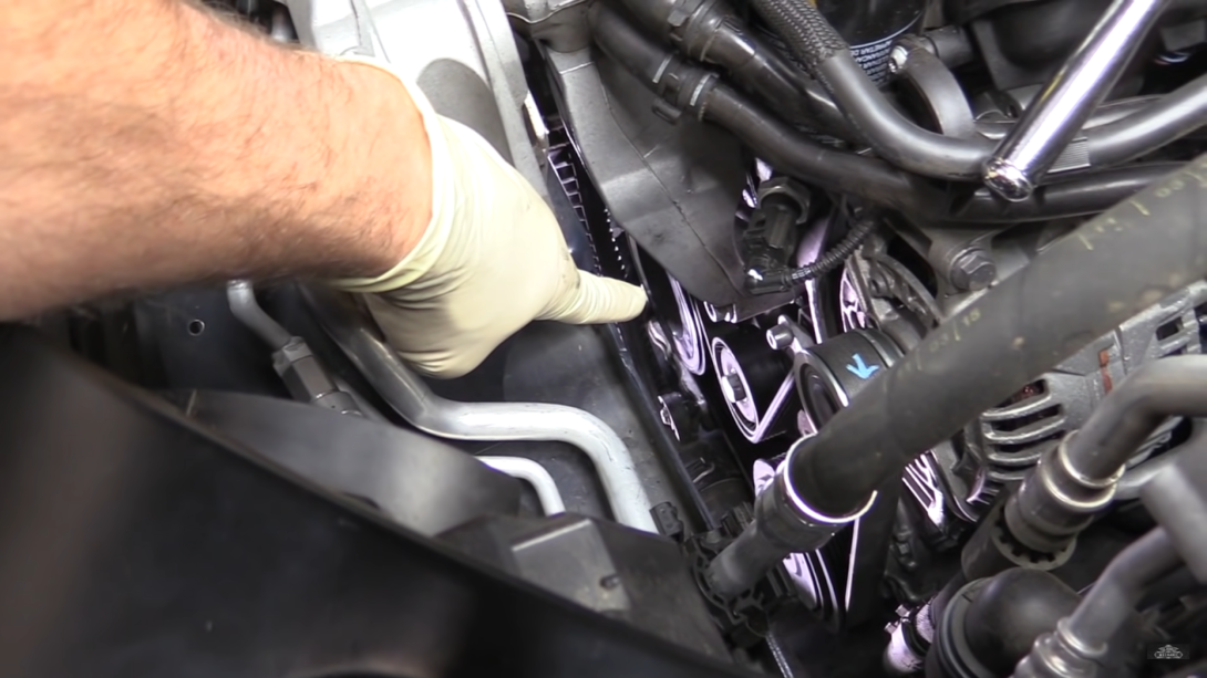 man pointing to the car spare parts